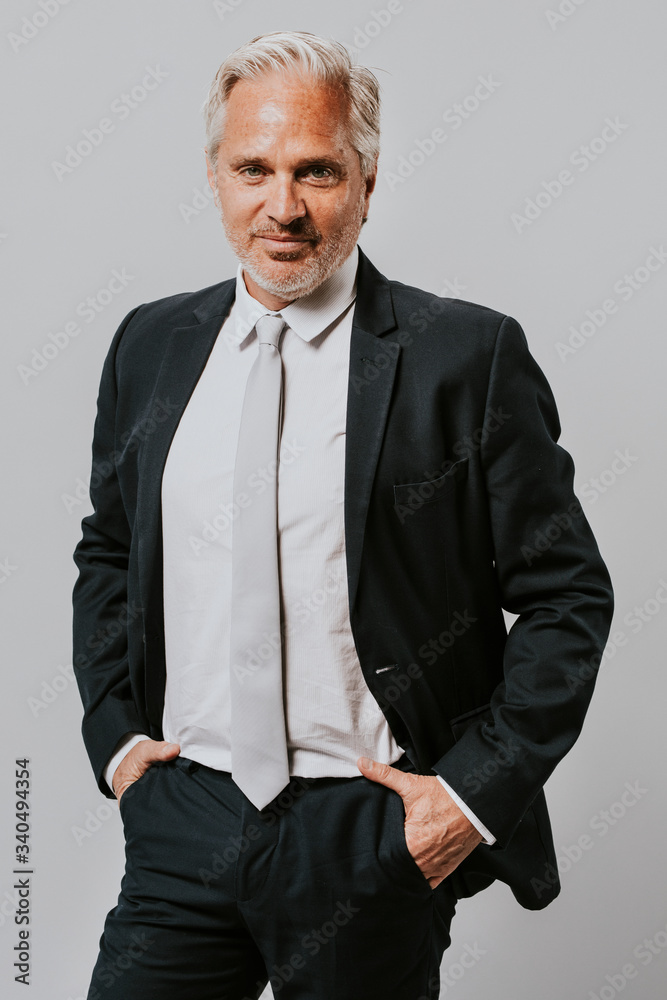 Confident businessman portrait in a studio