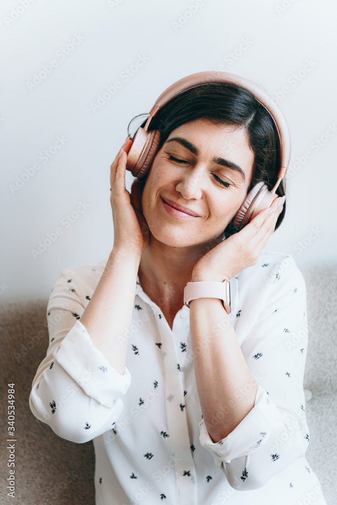 Woman enjoying listening to music