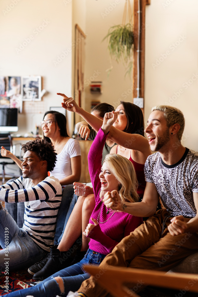 Friends cheering on their team