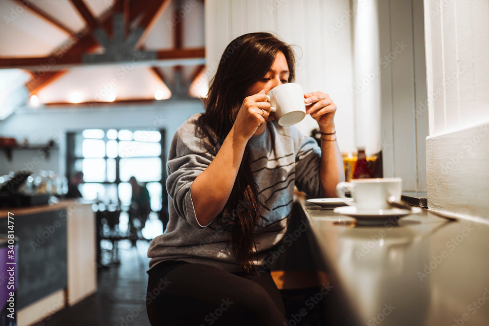 Having coffee at a cafe