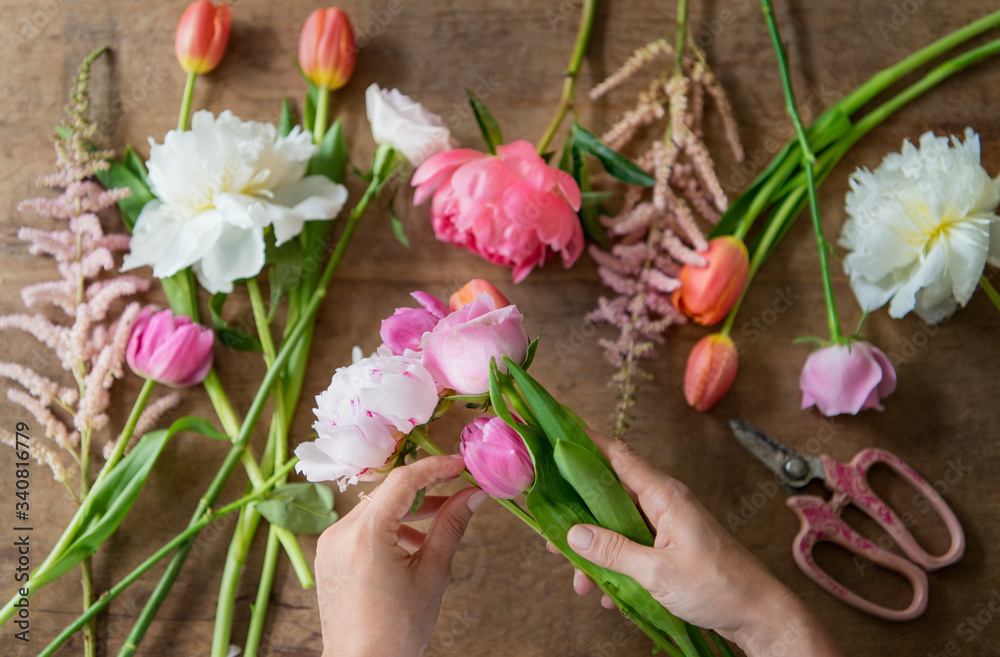 Woman arranging flowers