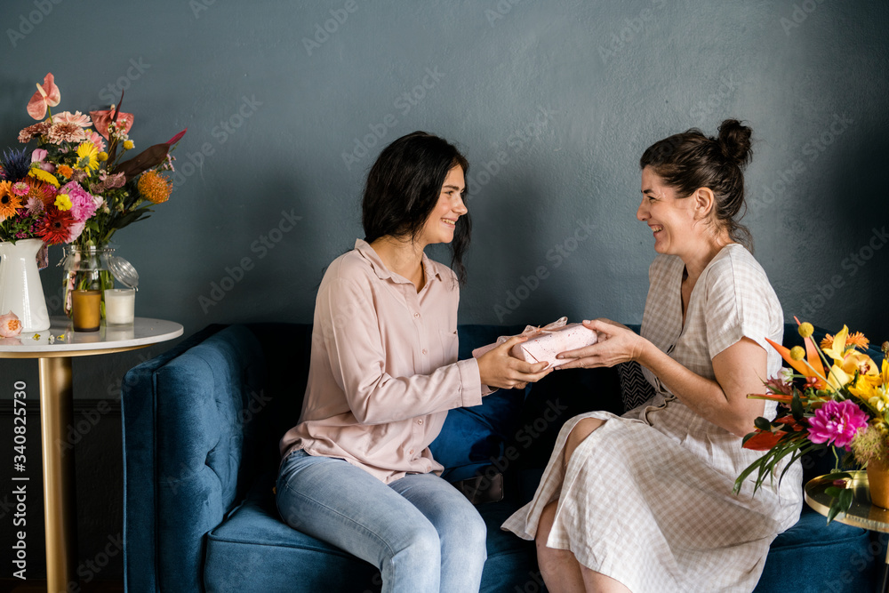 Women sitting in a sofa