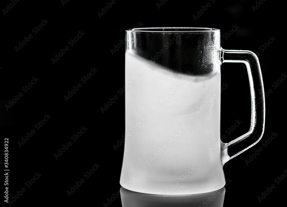 Frosted empty beer glass macro photography