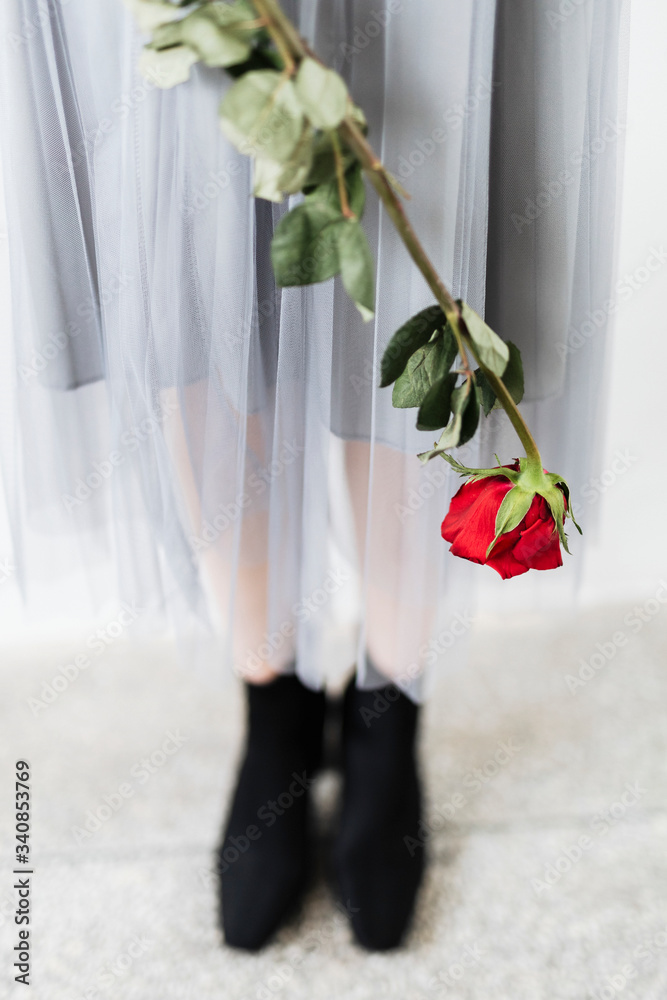 Woman with a red rose