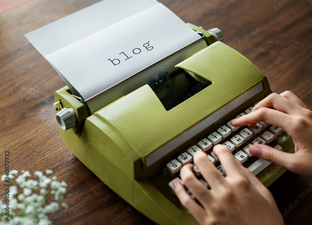 Aerial view of a man typing on a retro typewriter