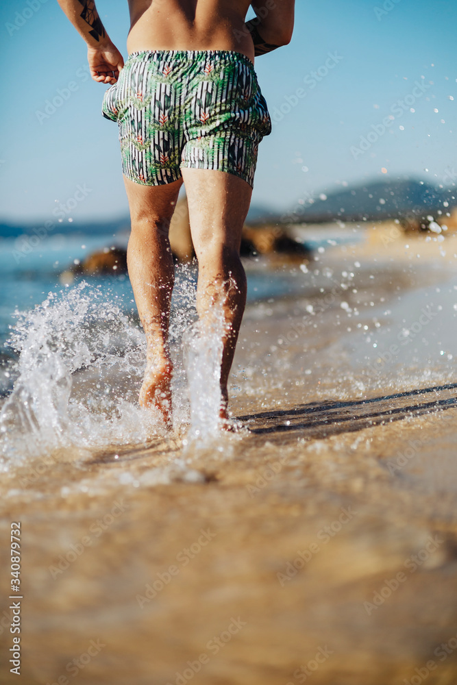 Man running at the beach