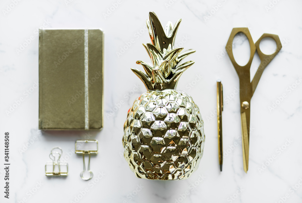 Flatlay of golden utensils decoration concept