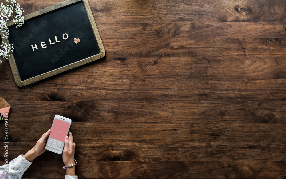 Aerial view of black board with the letter forming hello greeting concept