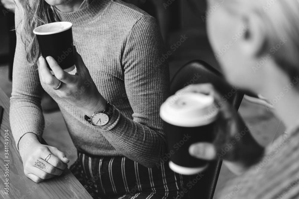 Friends enjoying a hot coffee together