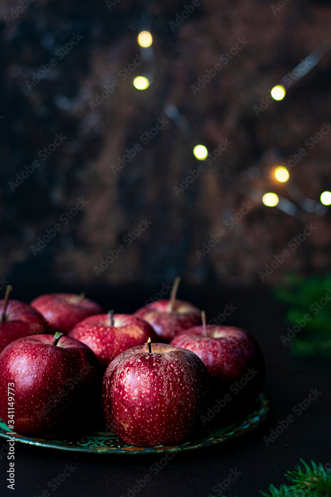 Red apples on black