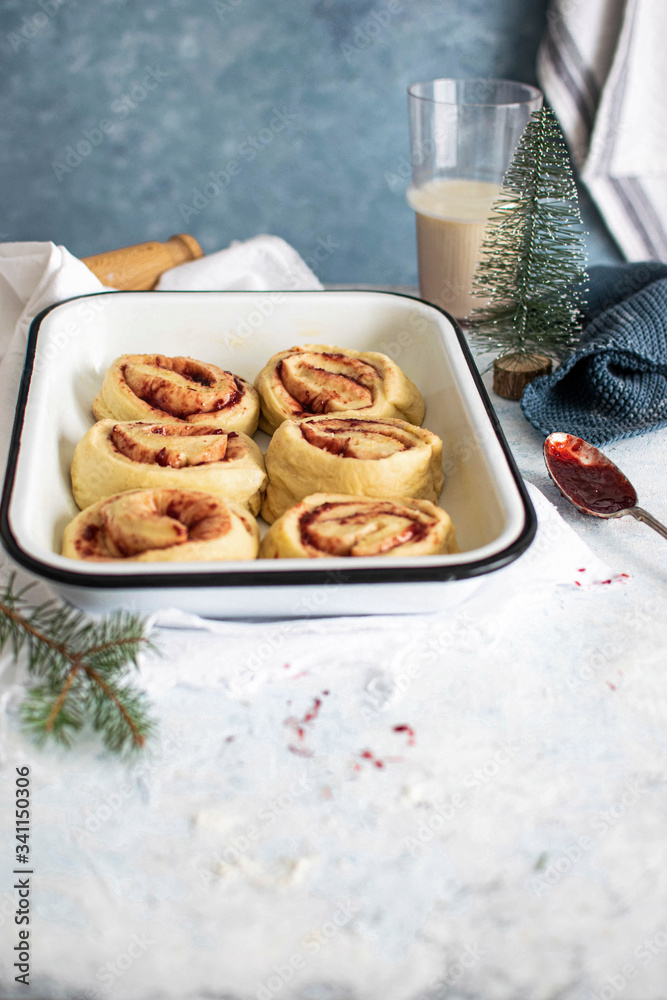 Rolled buns filled with cherry jam