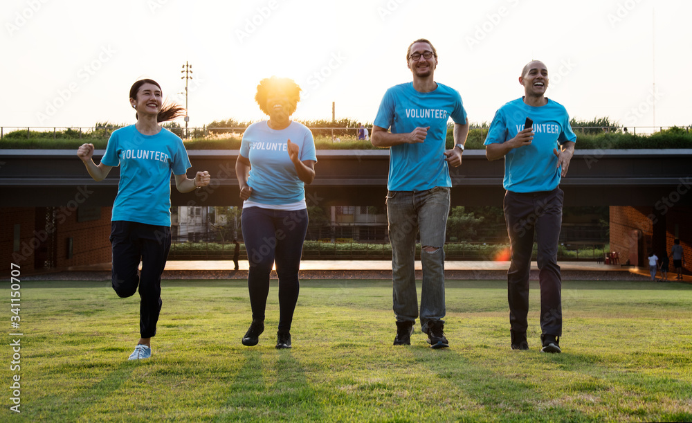 Group of happy and diverse volunteers