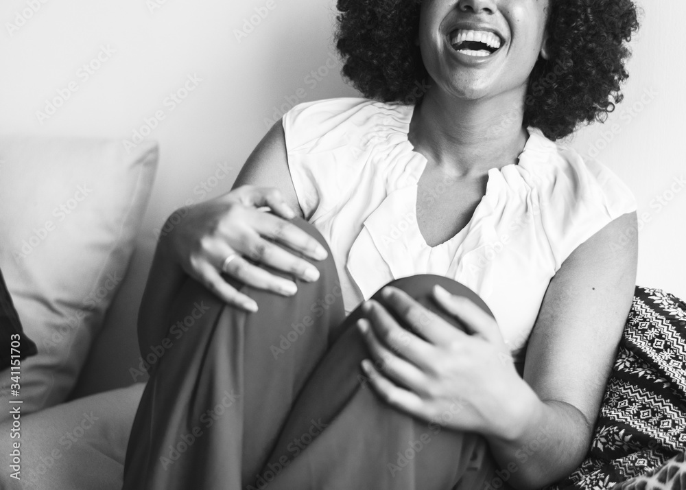 Woman laughing out loud with happiness