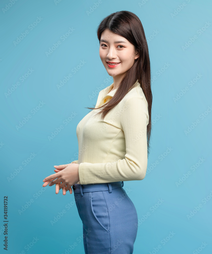 Asian girl on blue background

