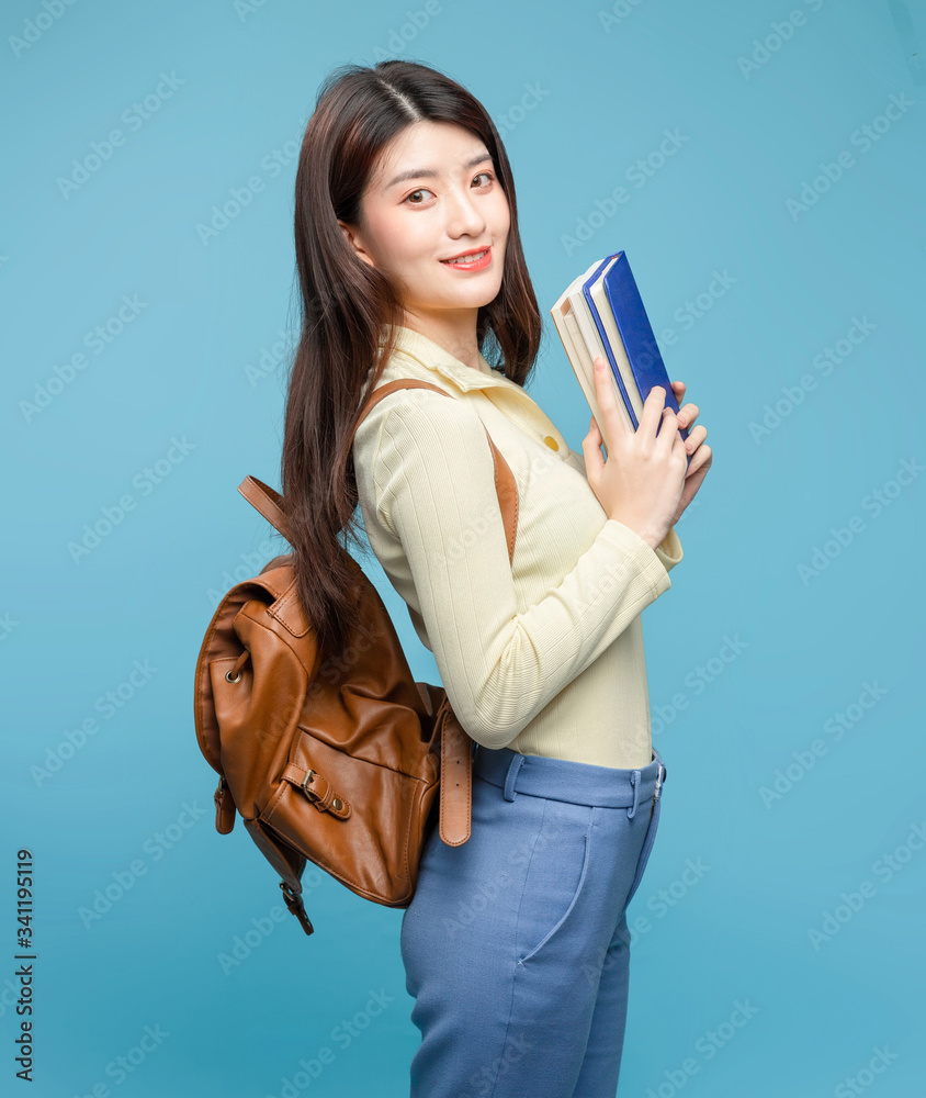 Asian girl on blue background

