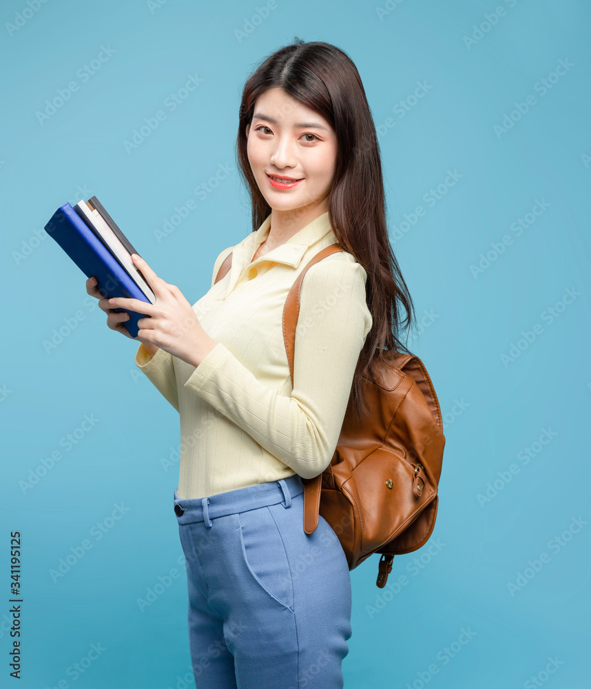 Asian girl on blue background

