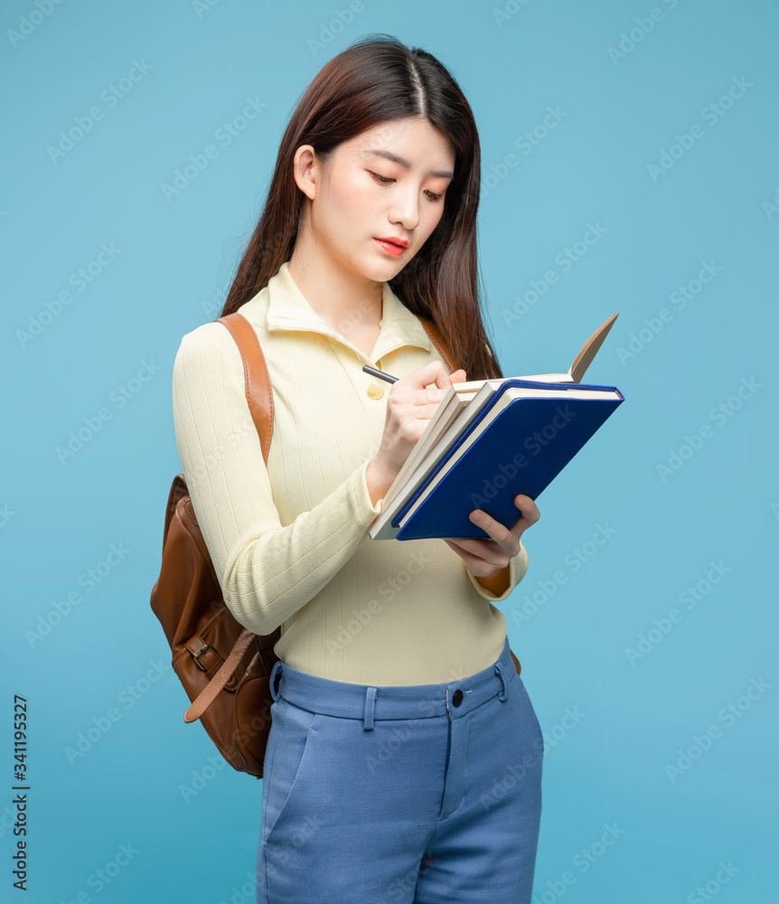 Asian girl on blue background

