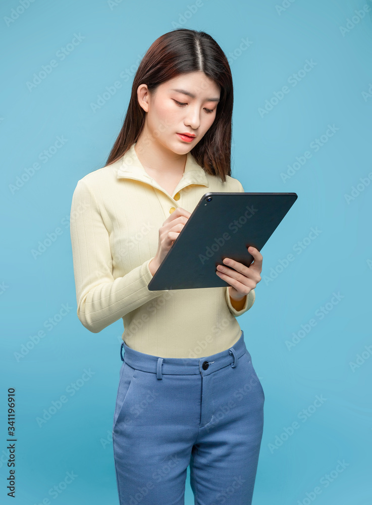 Asian girl on blue background

