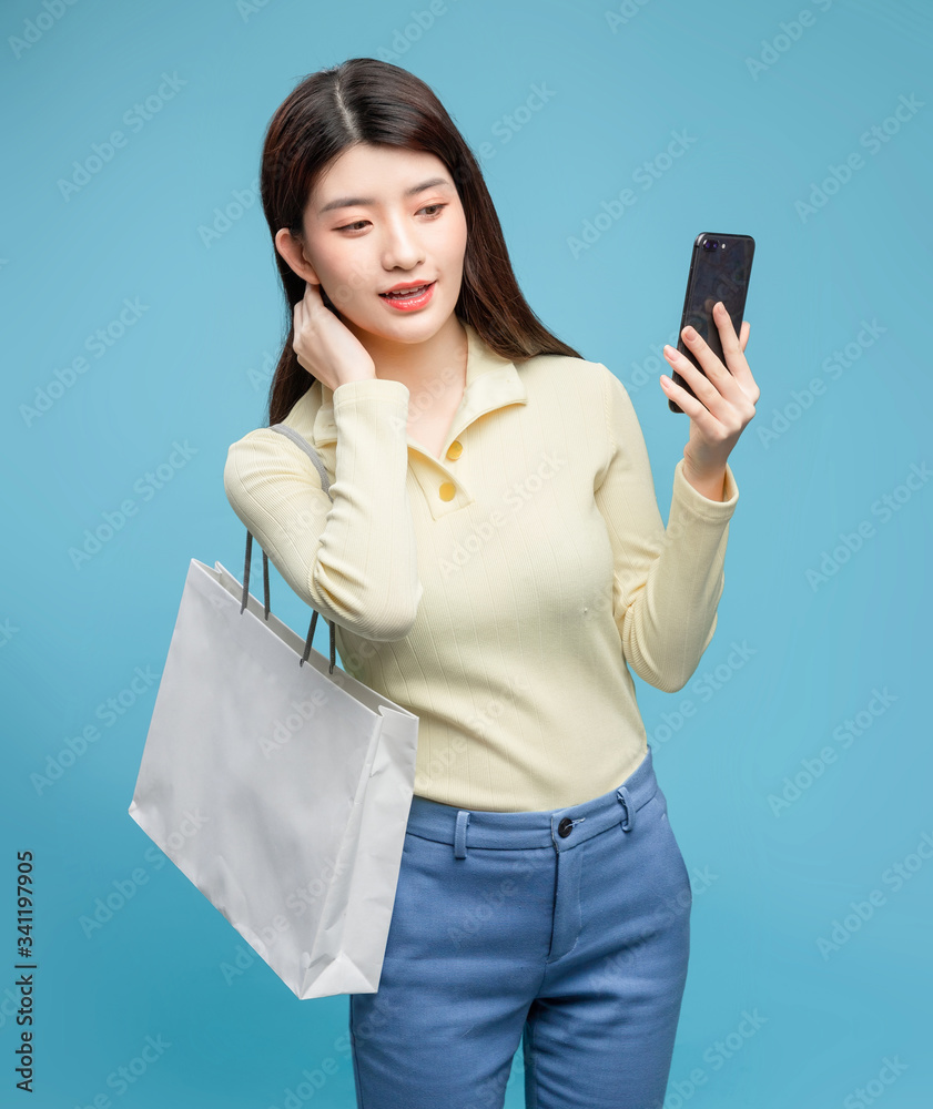 Asian girl on blue background

