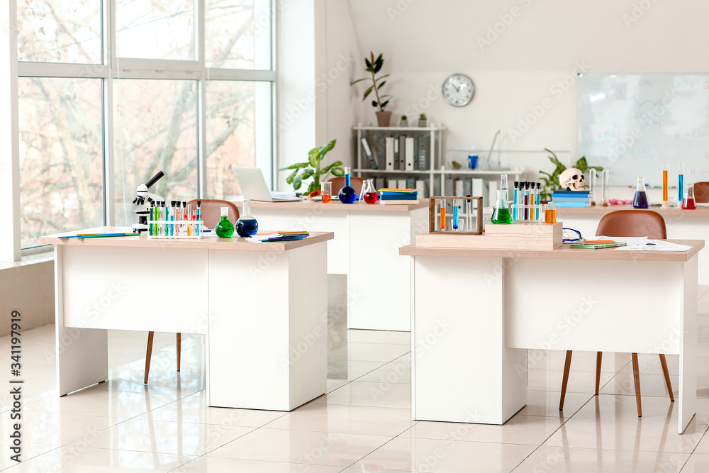 Interior of classroom prepared for chemistry lesson in modern school