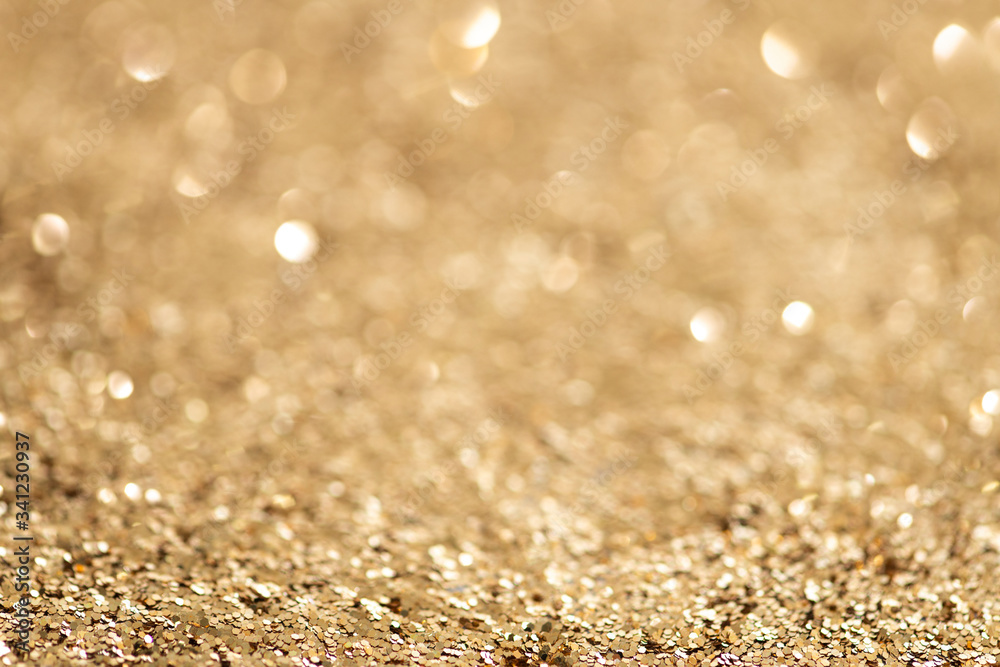 Shiny golden glitter background texture