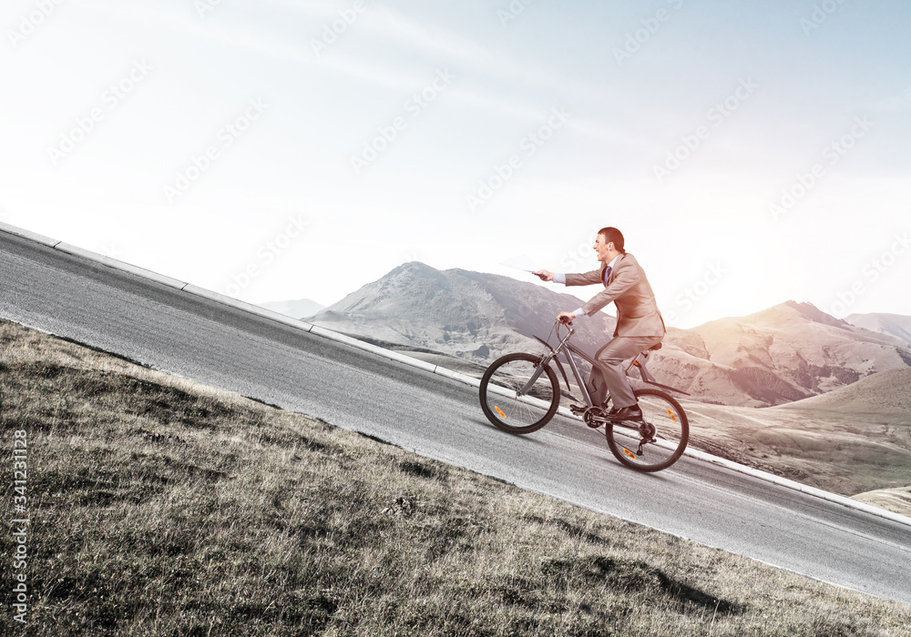 Businessman with paper documents in hand