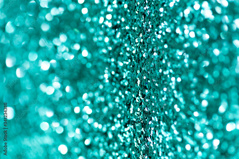 Shiny turquoise glitter textured background