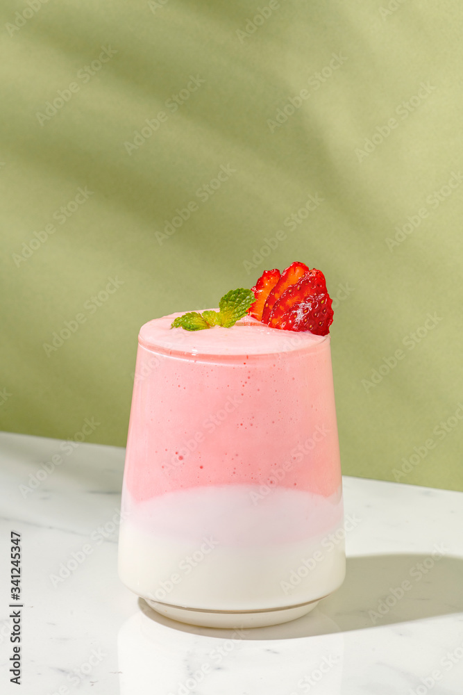 Layered strawberry and yogurt smoothie