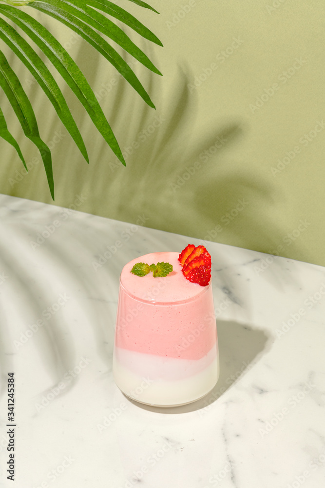 Layered strawberry and yogurt smoothie