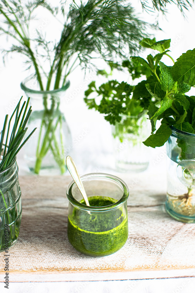 Green fresh organic herbs and homemade pesto ingredients