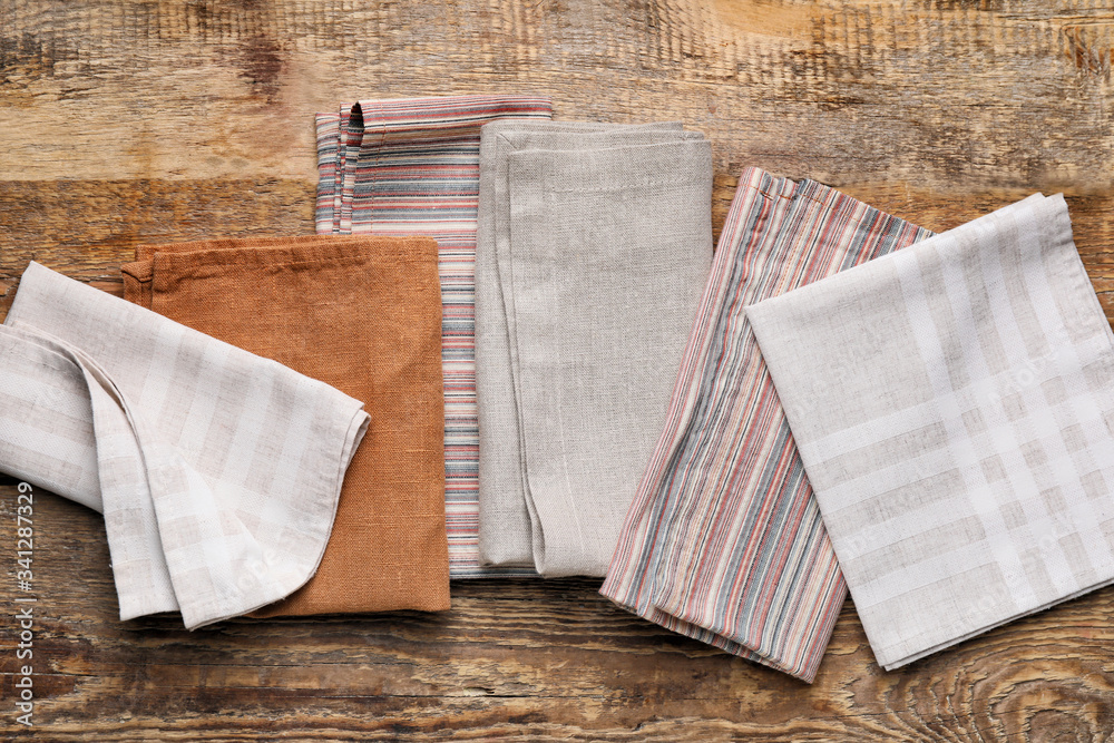 Clean napkins on wooden background