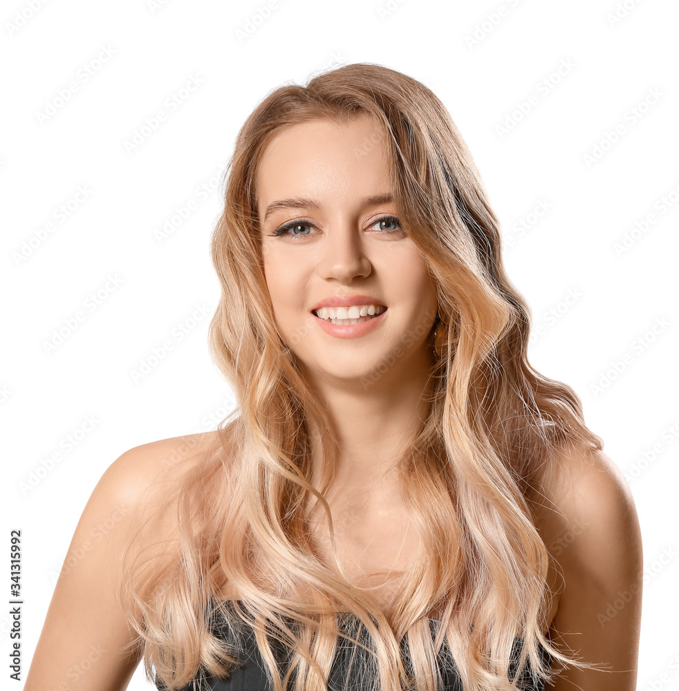 Young blonde with beautiful hair on white background