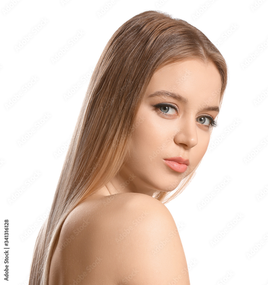 Young blonde with beautiful hair on white background