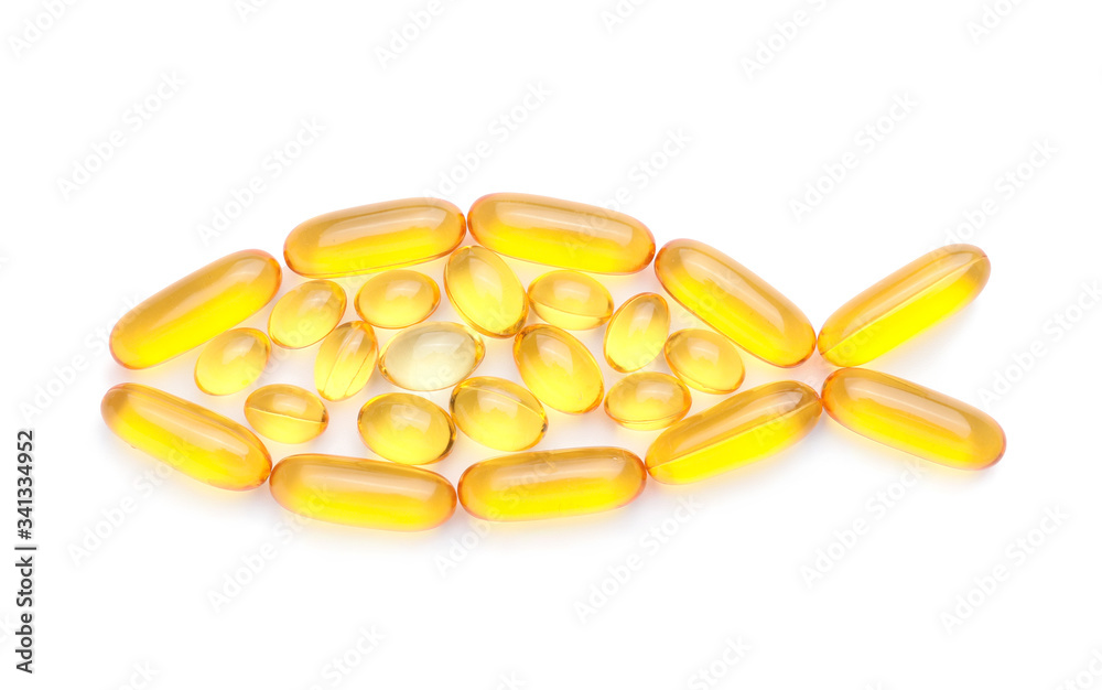 Composition with fish oil capsules on white background