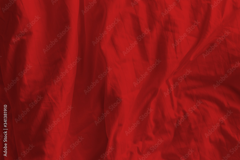 Wrinkled red blanket as a background