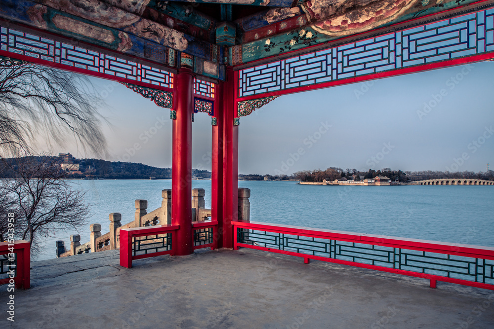 Pavilion on the west embankment of the Summer Palace in Beijing, China. Sunset scenery of beijing su