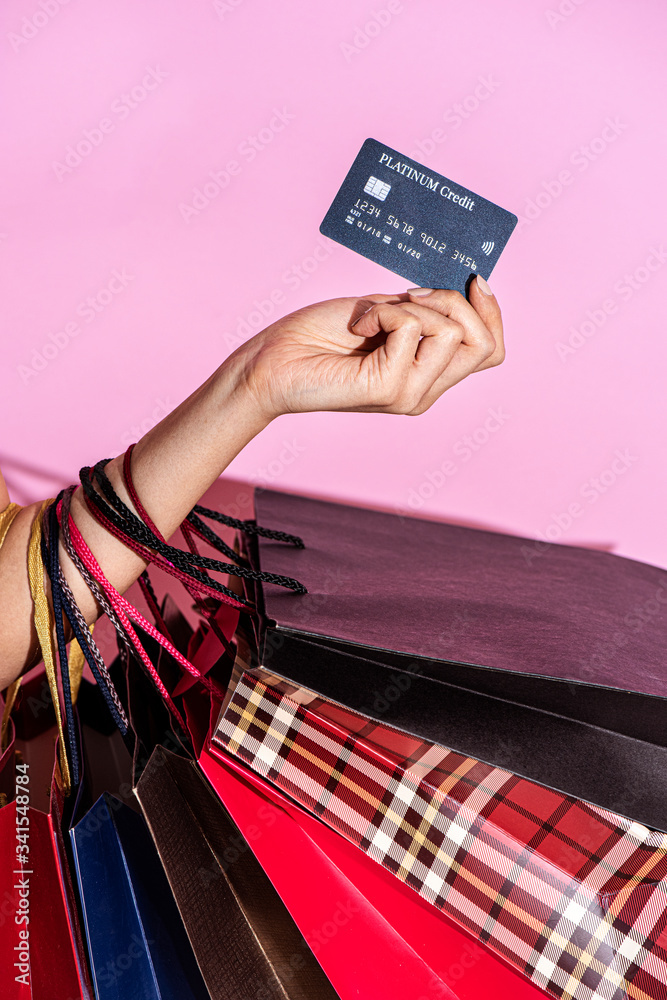 Shopaholic woman with shopping bags