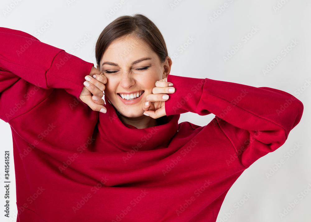 Cheerful smart woman smiling isolated on background