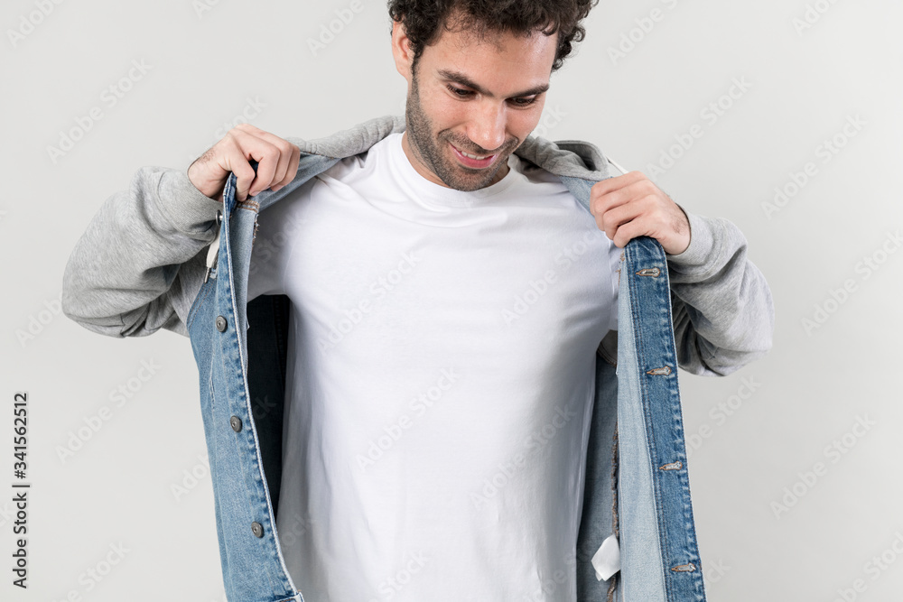 Man in a half denim hoodie jacket