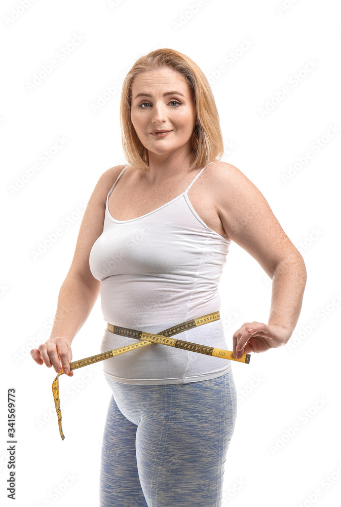 Overweight woman with measuring tape on white background. Weight loss concept