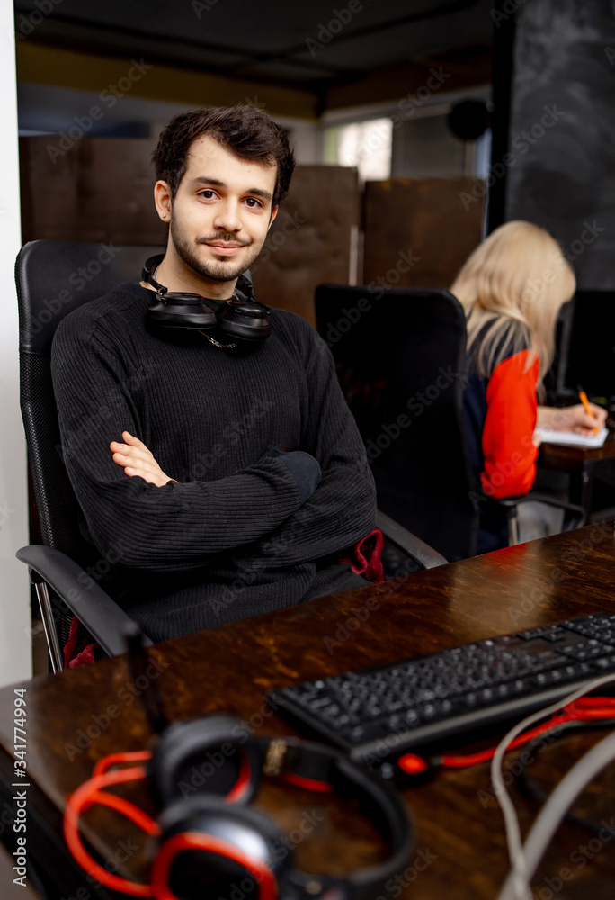 Website design programming and coding technologies. Man at work near computer. Creative Office