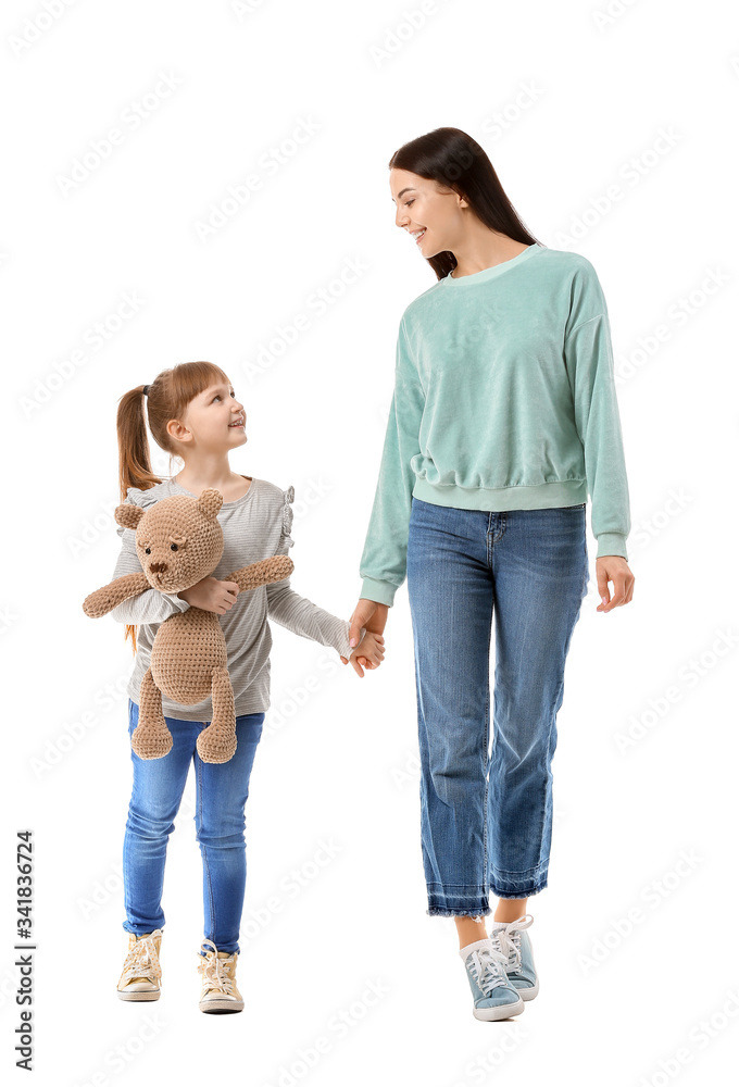 Happy woman with little adopted girl on white background