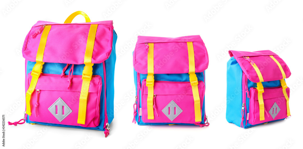 School backpacks of different sizes on white background