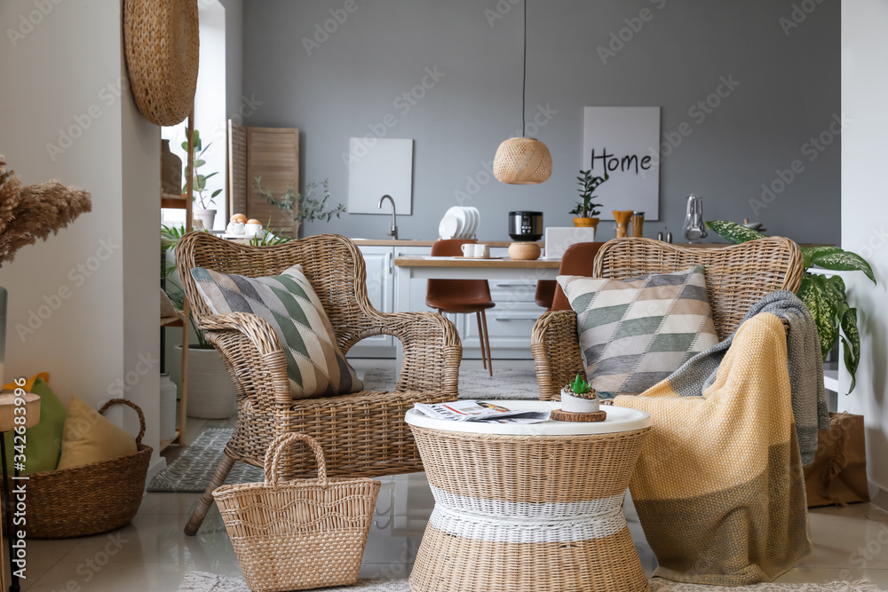 Interior of modern room with wicker furniture