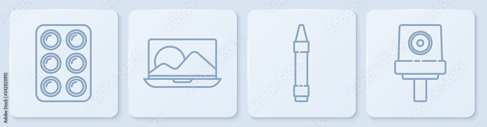 盒装水彩颜料，绘图用蜡笔，笔记本电脑和喷雾罐喷嘴帽。白色