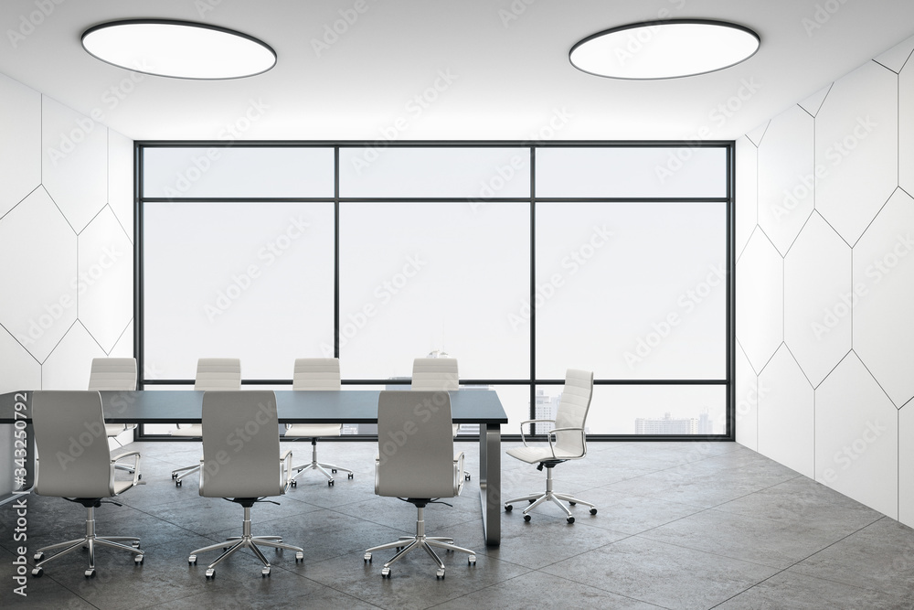 Bright meeting room interior with panoramic city view.