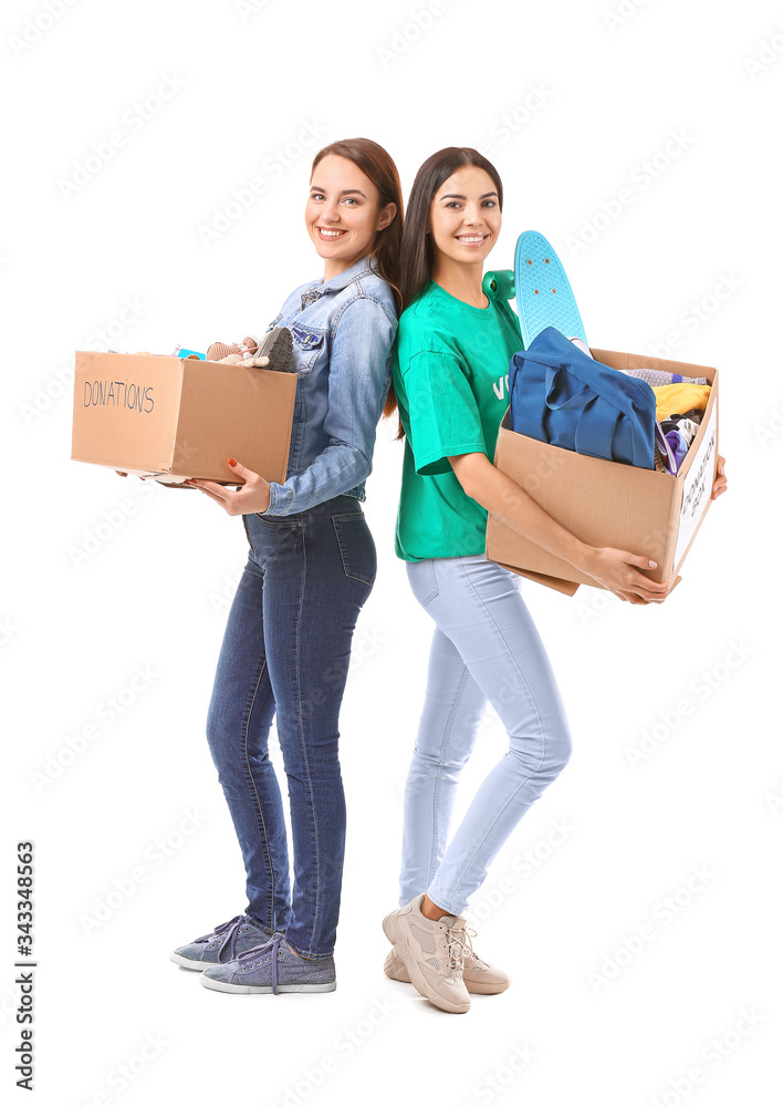 Volunteers with donations for orphans on white background