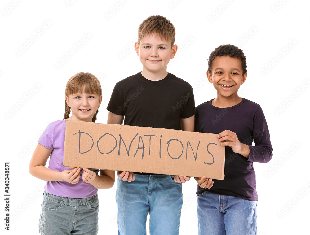 Children holding cardboard with text DONATIONS on white background