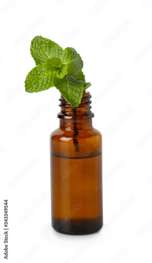 Bottle with mint essential oil on white background