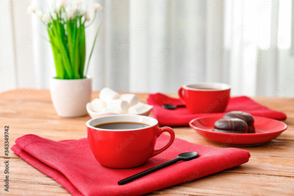 Cup of coffee on table in cafe